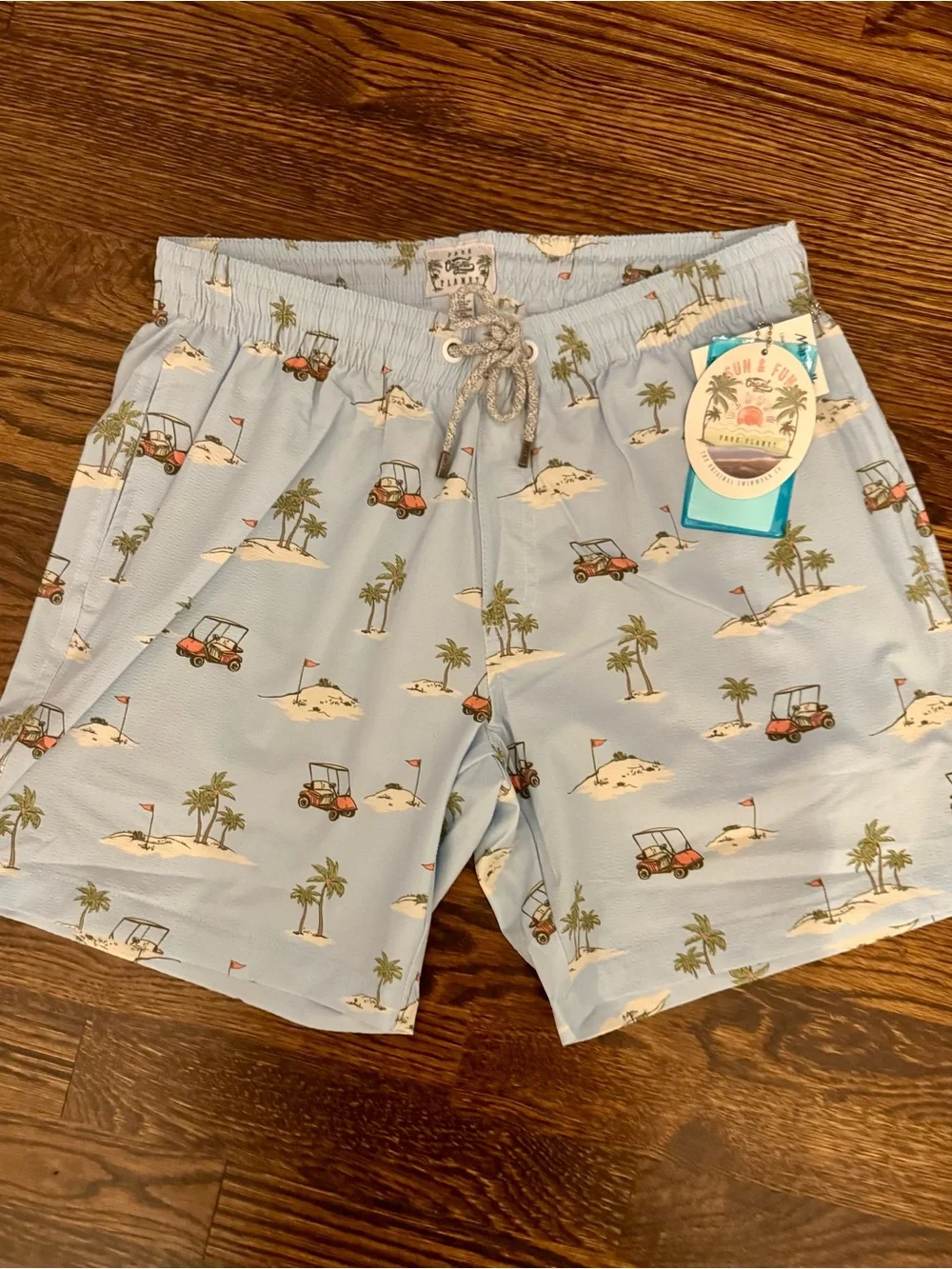 Free Planet Men’s Light Blue Golf Cart & Palm Print Swim Trunks- Medium